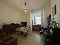 Rue Emile Carpentier salon - RDC | Immo ICC, Agence immobilière Anderlecht 1070.